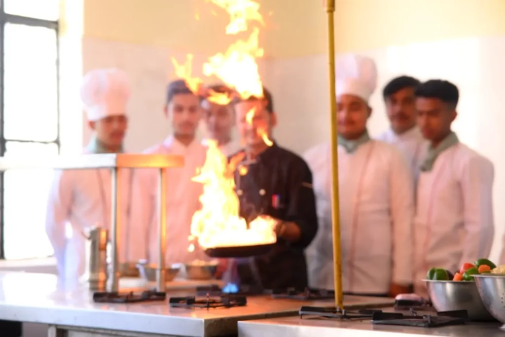 Flambé demonstration in the IHMS training kitchen