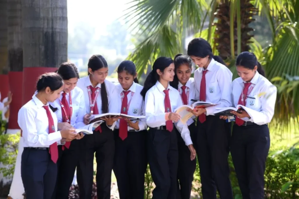 IHMS students reading together outdoors